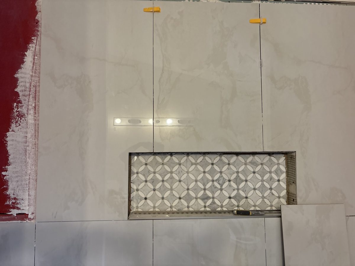 Mosaic tile shower niche detail
