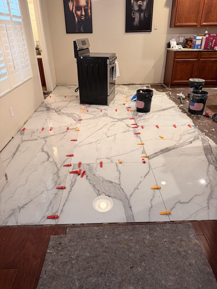 Marble-look tile floor installation