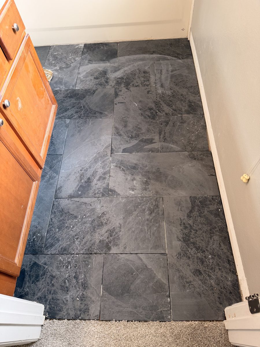 Dark slate tile flooring
