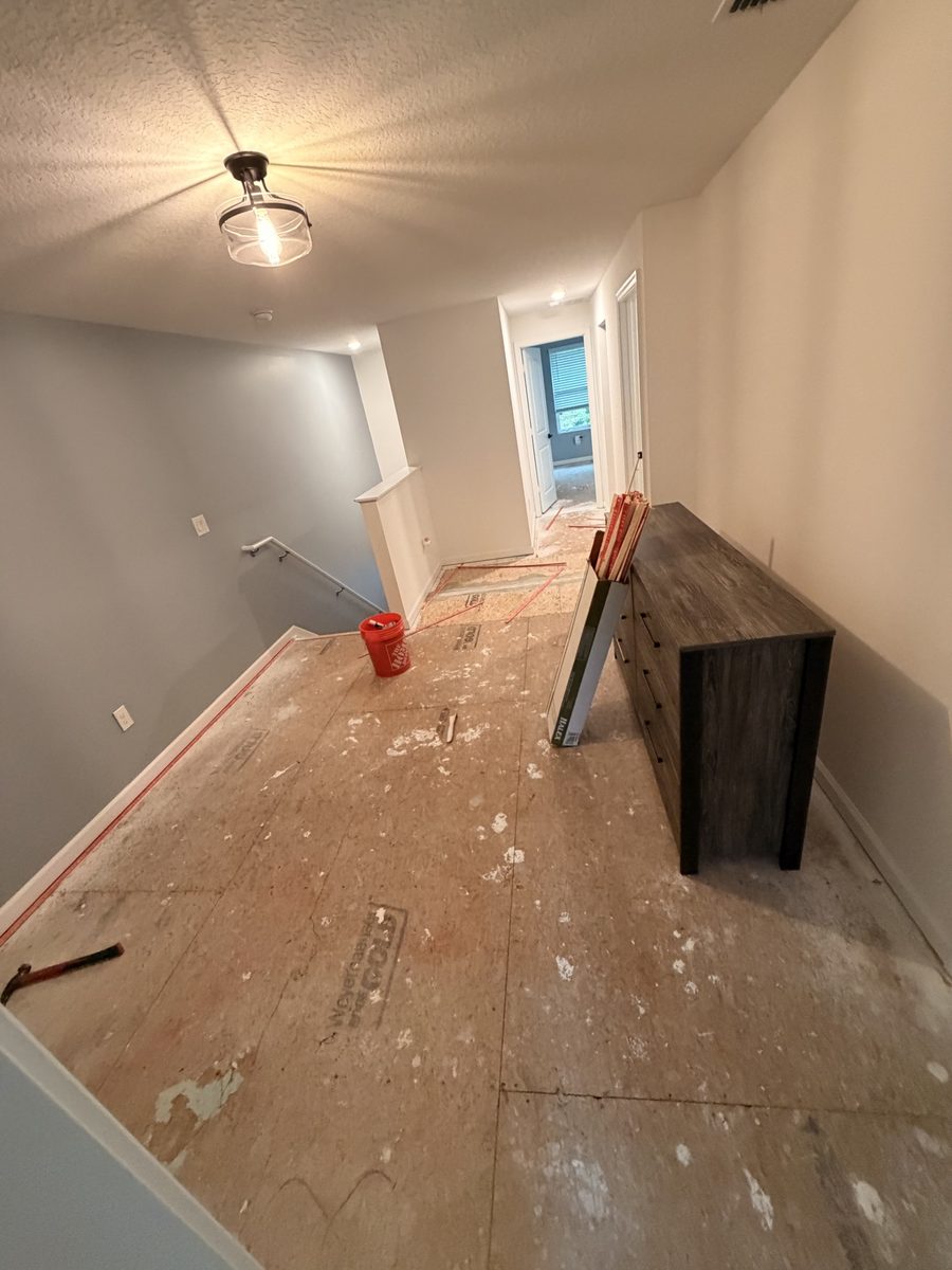 Hallway subfloor before carpet install