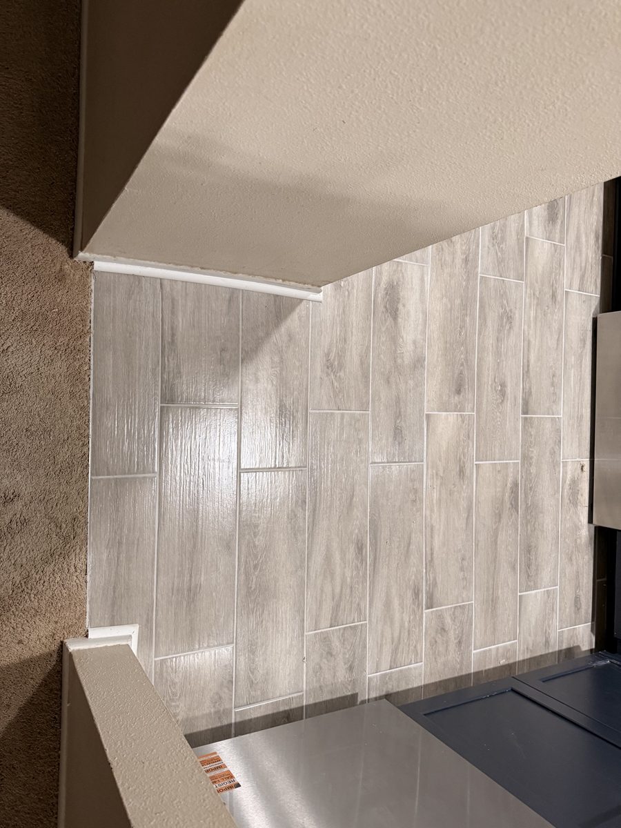 Wood-look tile floor at doorway