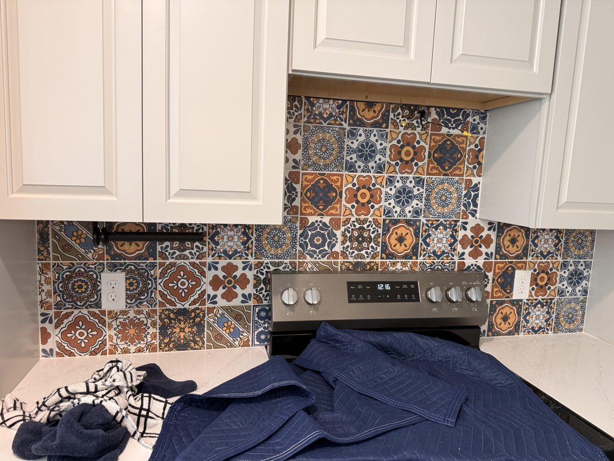 Colorful patterned tile kitchen backsplash