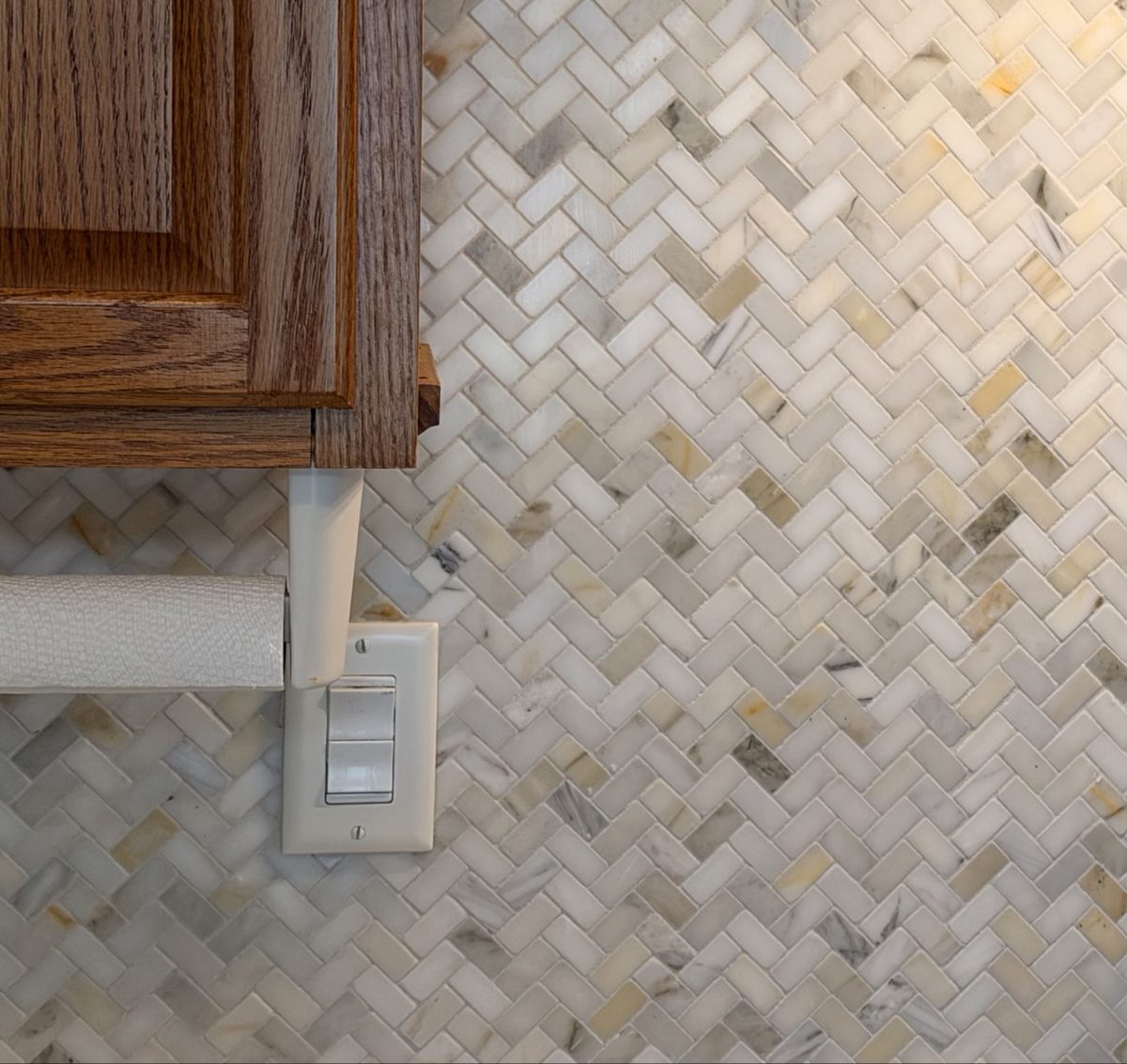 Herringbone marble backsplash