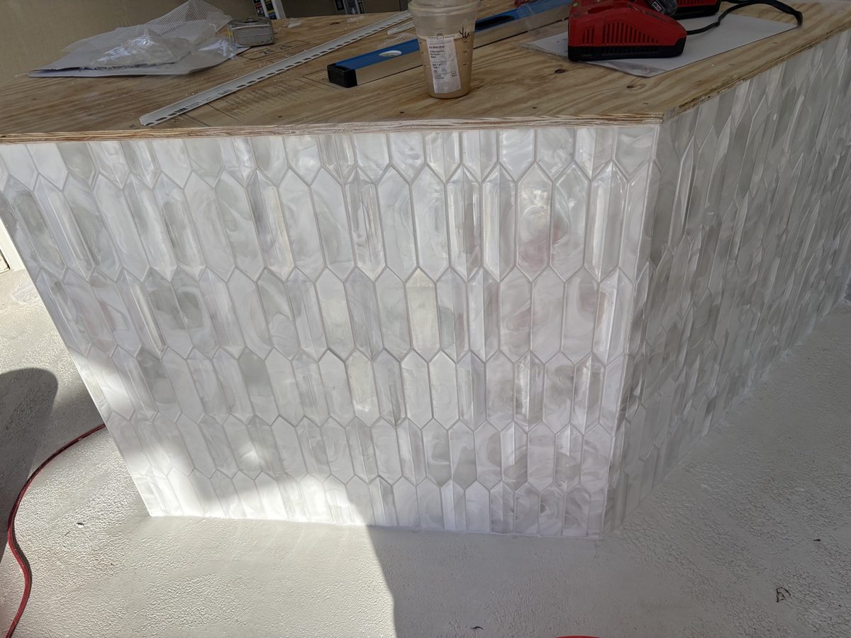Outdoor bar with white picket tile